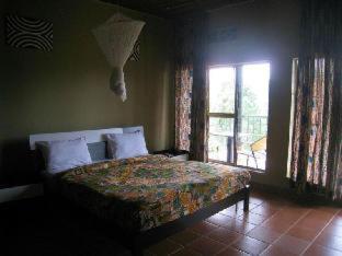 Nyungwe Top View Hill Hotel Гисеньи Номер фото